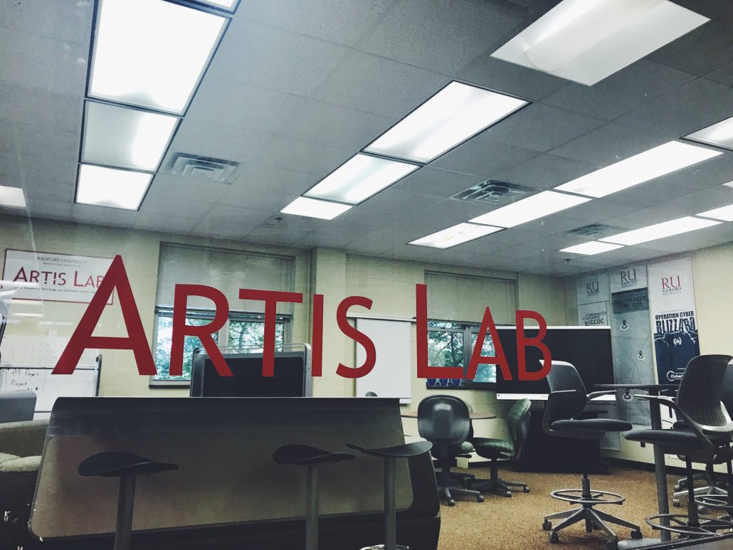 Sign on the window of Radford University Artis Lab in Radford, VA