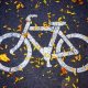 Bikeshare NRV, NRV Bikeshare program coming to the New River Valley, painted bike logo on a side walk with fall leaves